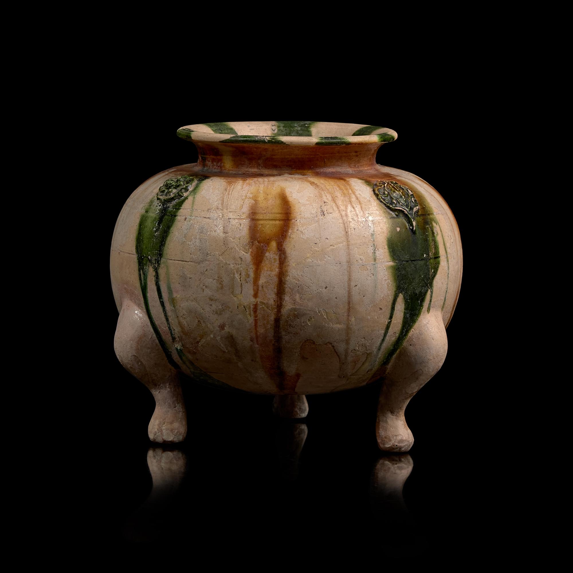 A Chinese Sancai Glazed Tripod Censer, Tang Dynasty 唐 三彩貼塑三足罐