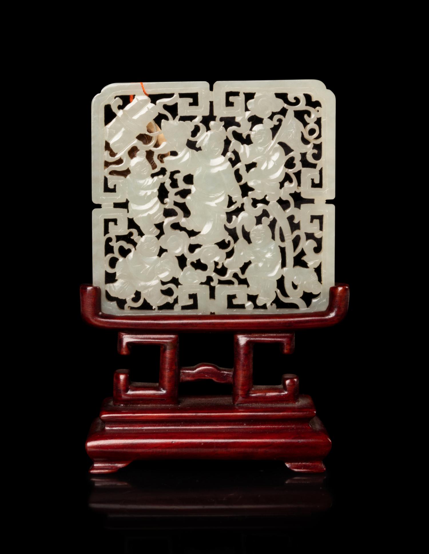 A Chinese White Jade Reticulated Plaque