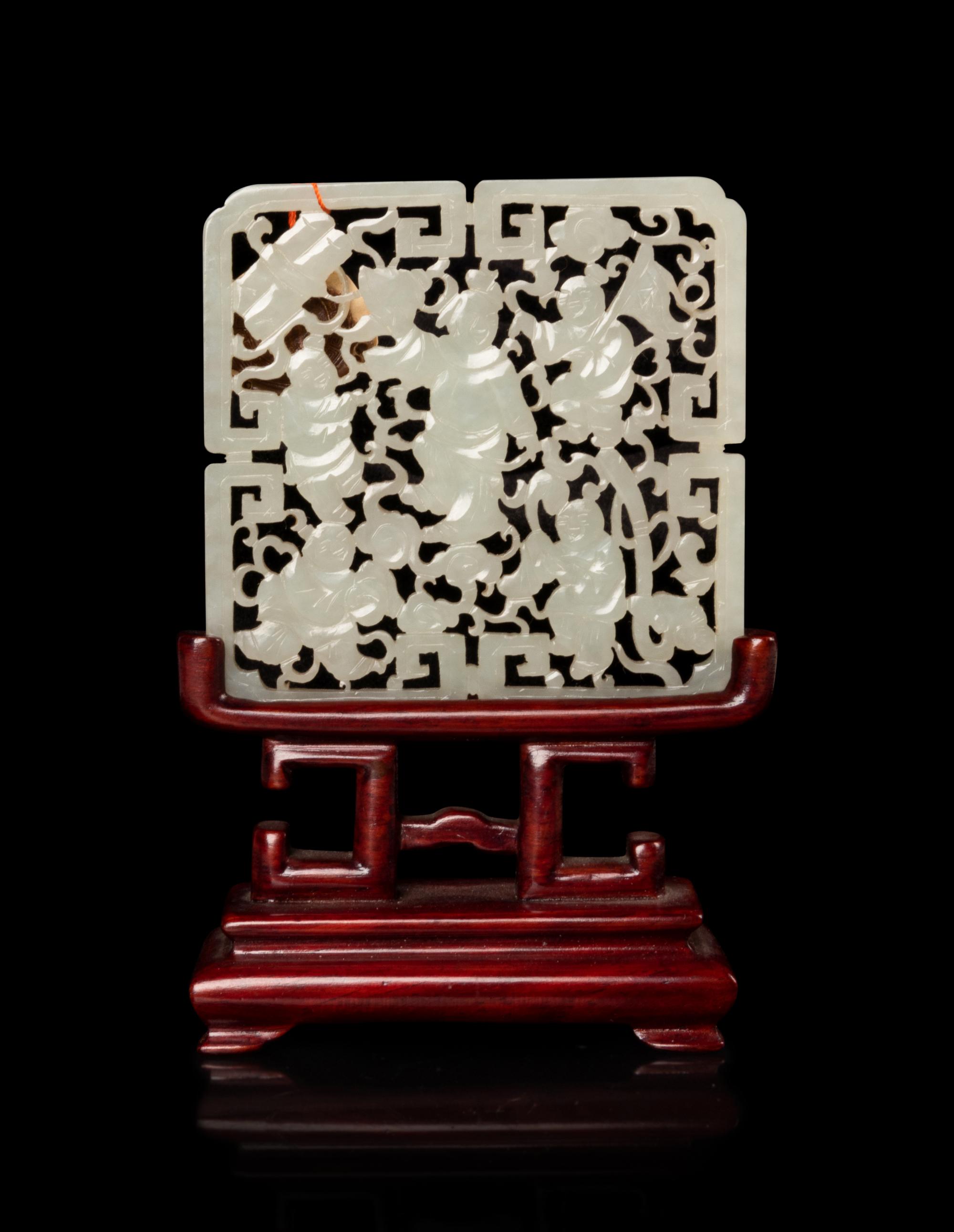 A Chinese White Jade Reticulated Plaque