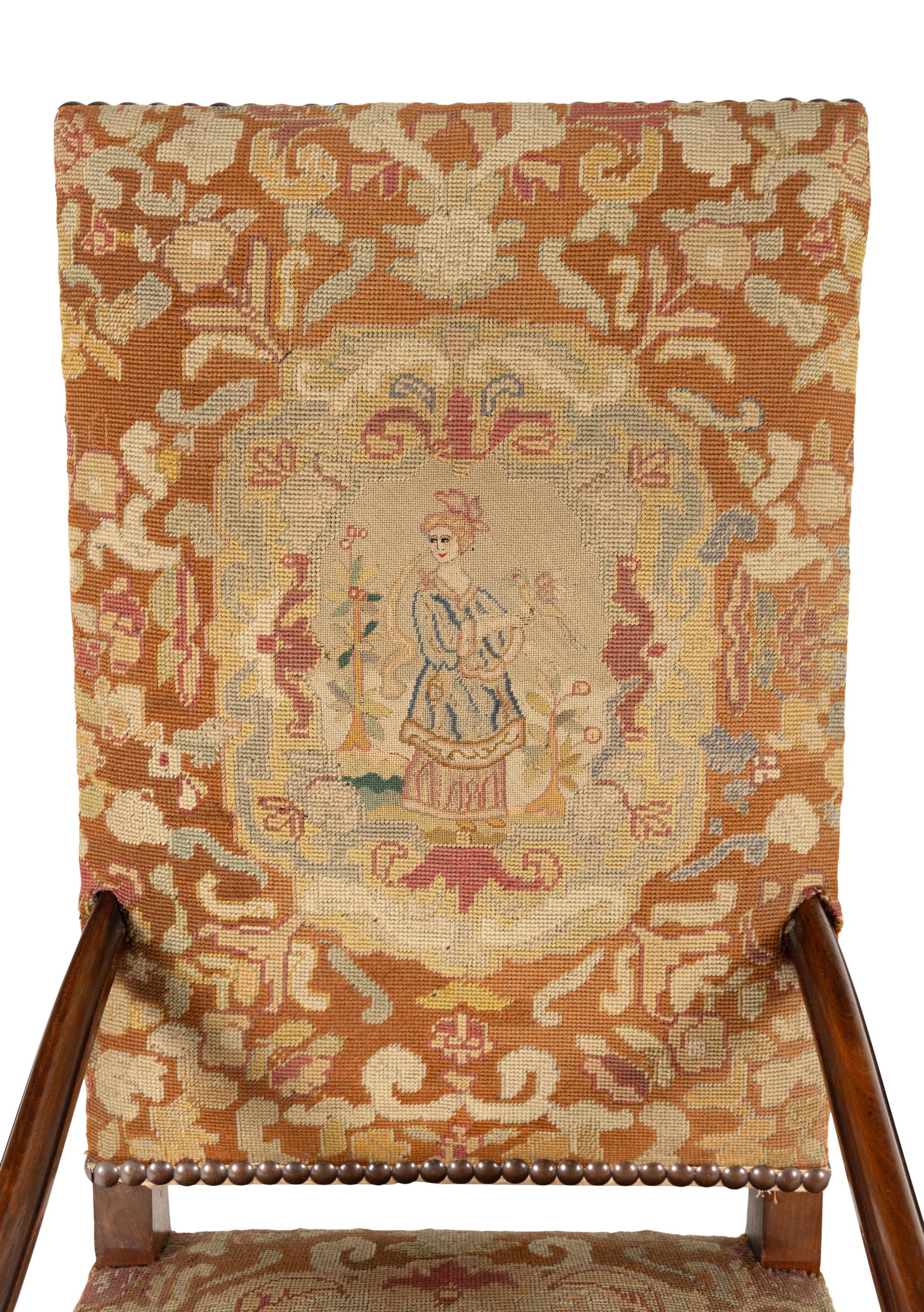 A William and Mary Style Carved Walnut Tapestry-Upholstered Armchair