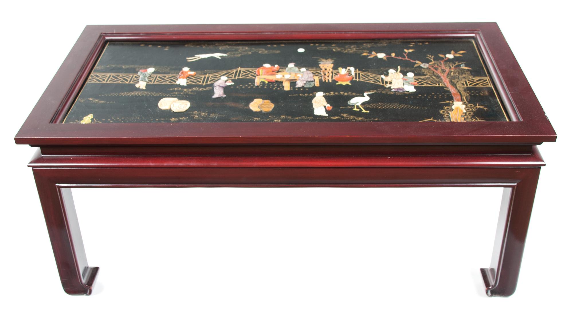 A Chinese Lacquered Low Coffee Table Height 18 x width 40 x depth 21 inches.