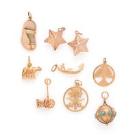 COLLECTION OF YELLOW GOLD CHARM BRACELETS