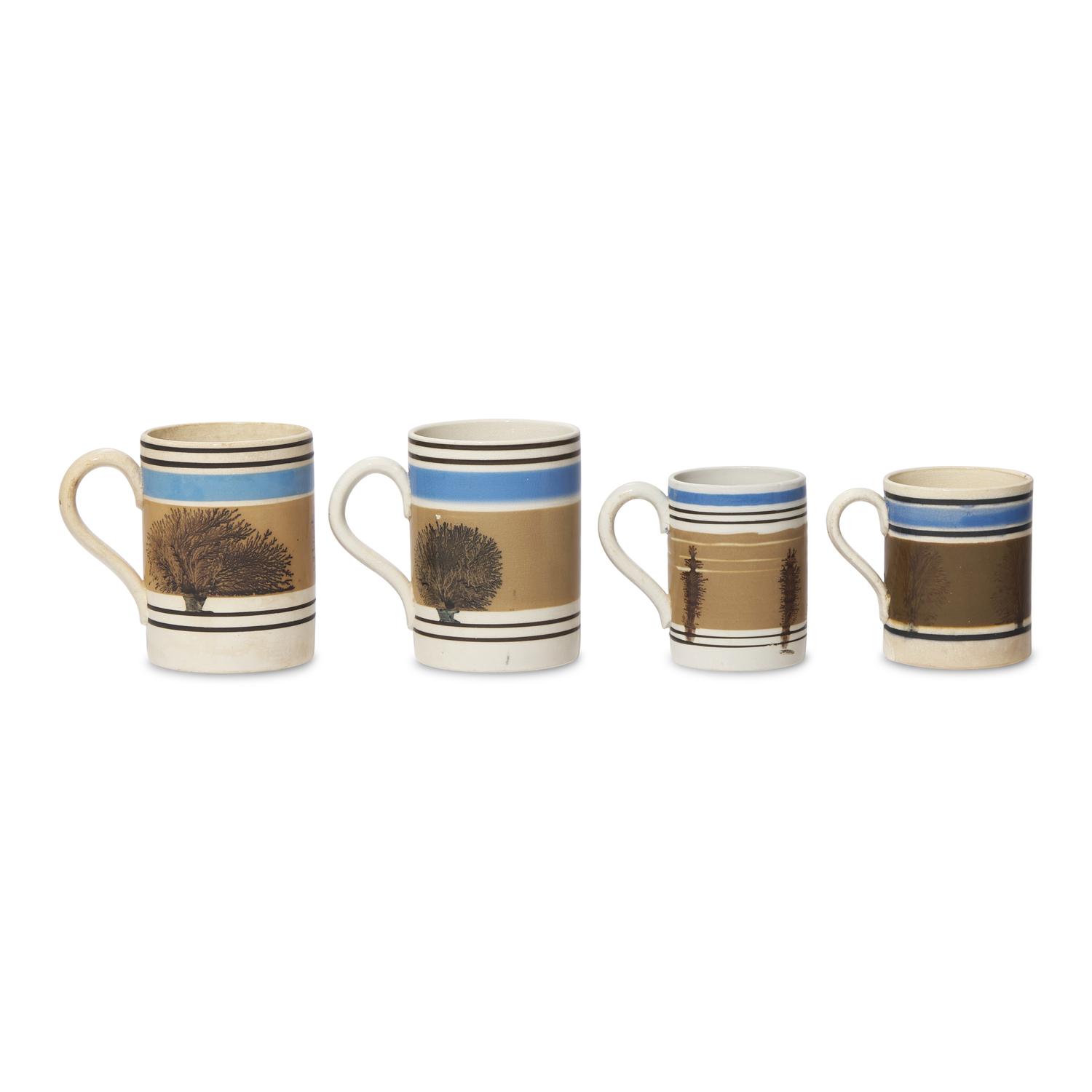 A Group of Four Mochaware Mugs with "Seaweed Decoration"