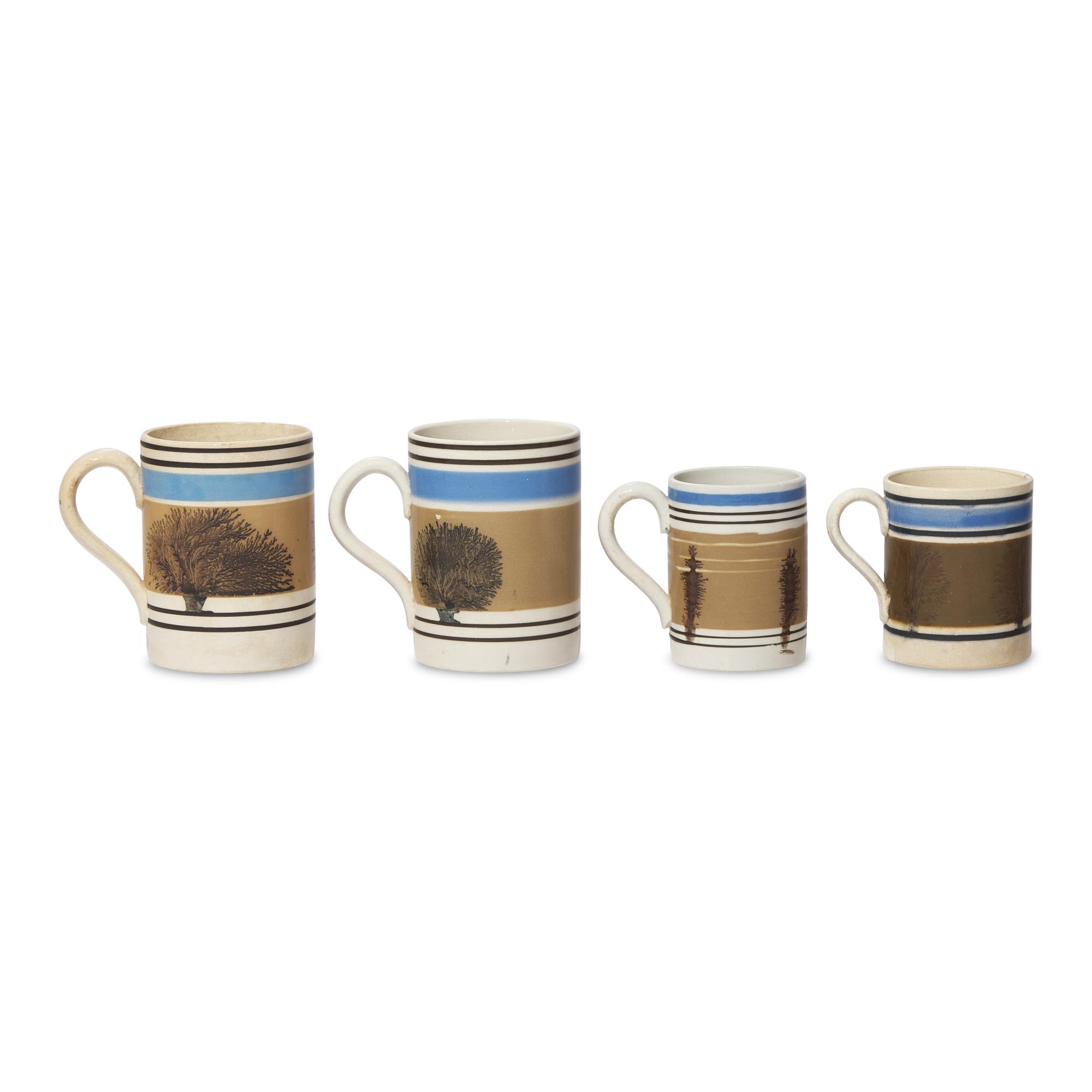 A Group of Four Mochaware Mugs with "Seaweed Decoration"