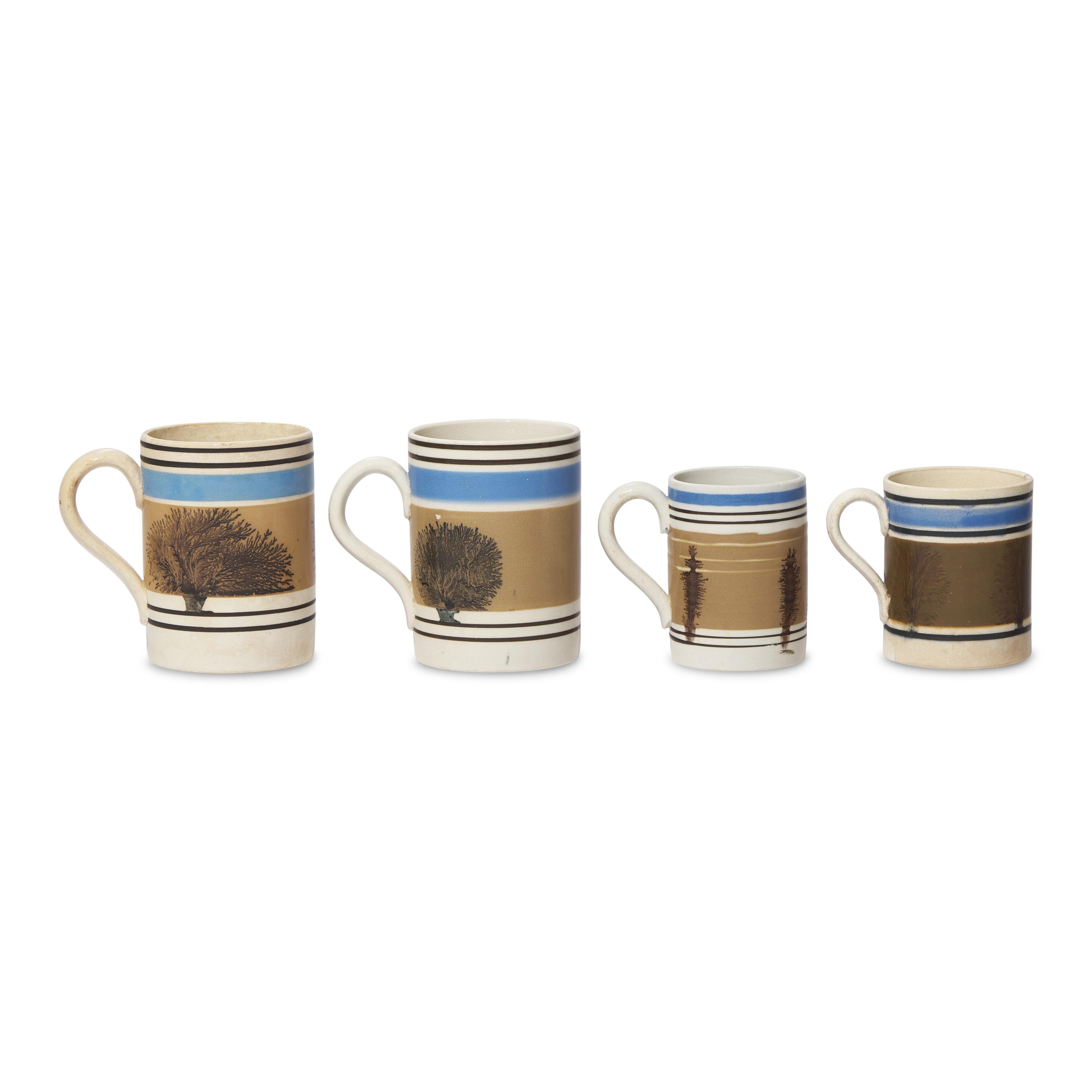 A Group of Four Mochaware Mugs with "Seaweed Decoration"