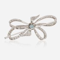 A Platinum, Diamond, and Blue Zircon Brooch