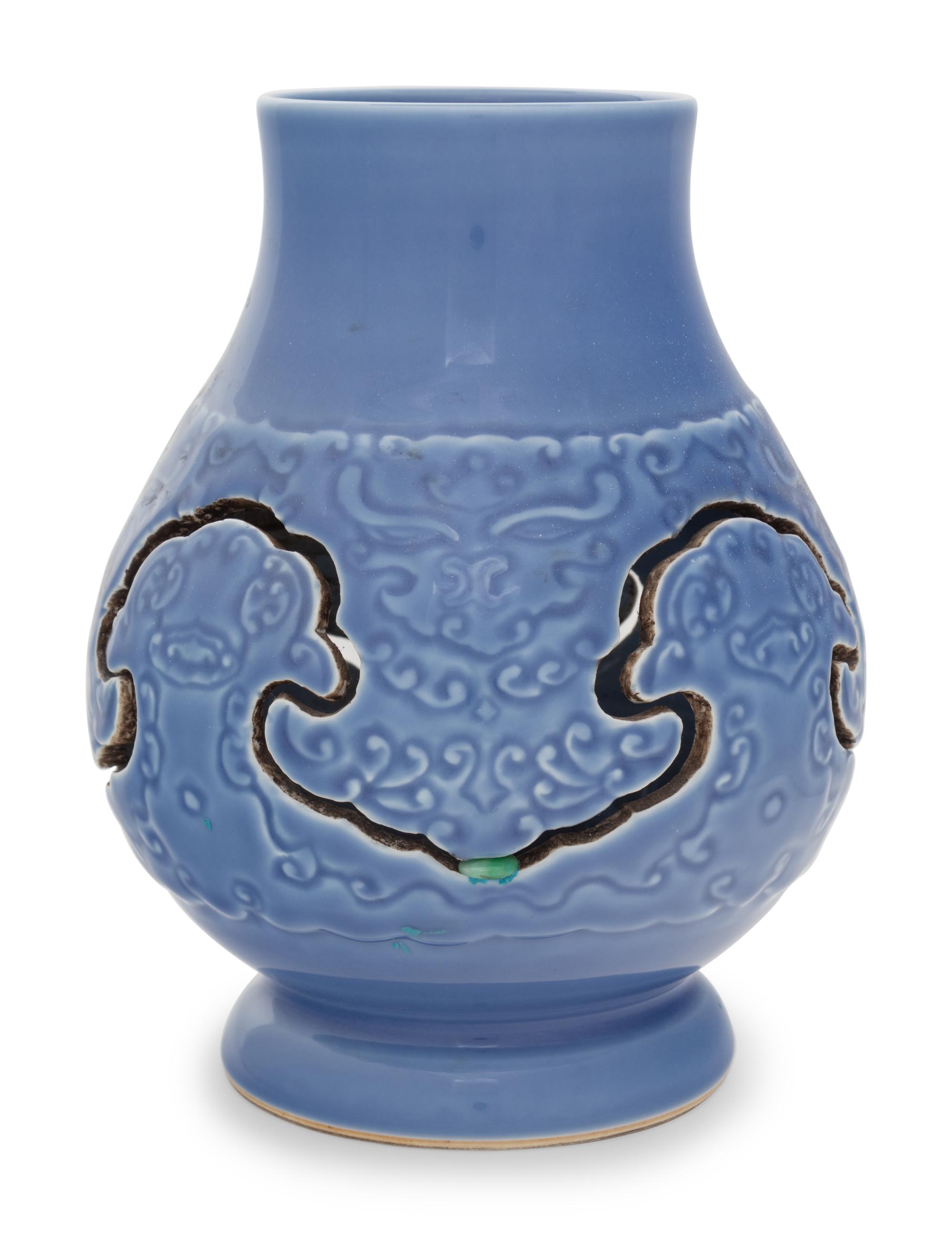 A Claire-de-Lune Glazed Carved Porcelain Reticulated Vase