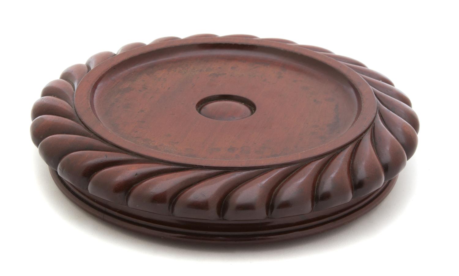 An English Carved Mahogany Circular Base Diameter 9 1/2 inches. — 19TH CENTURY