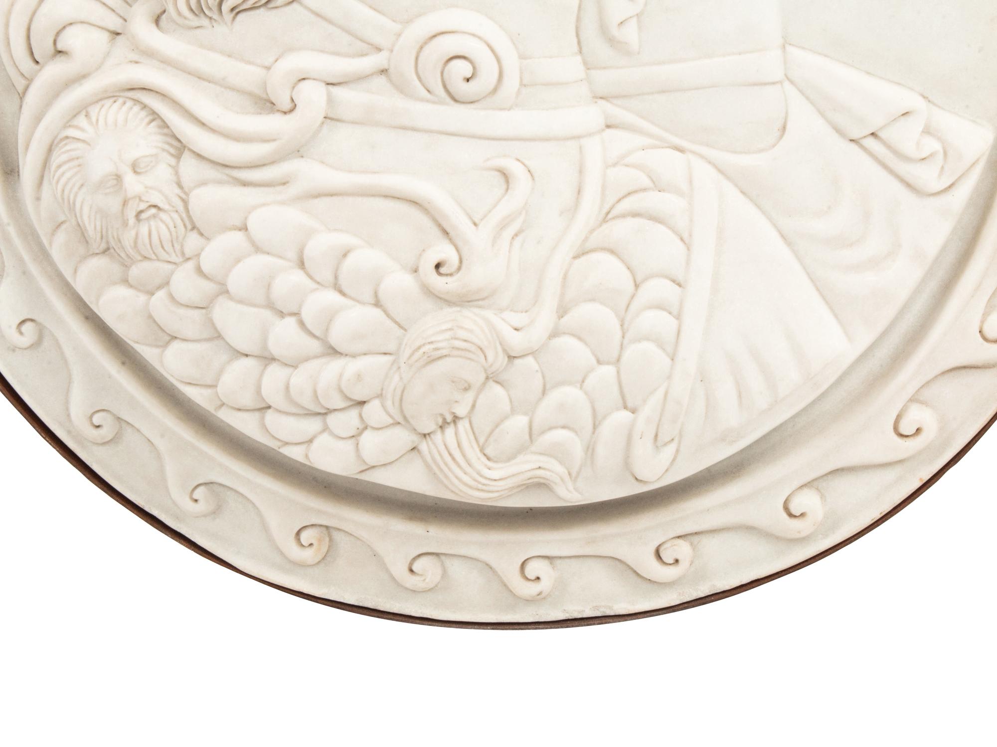 An Italian Iron-Mounted Marble Profile Medallion