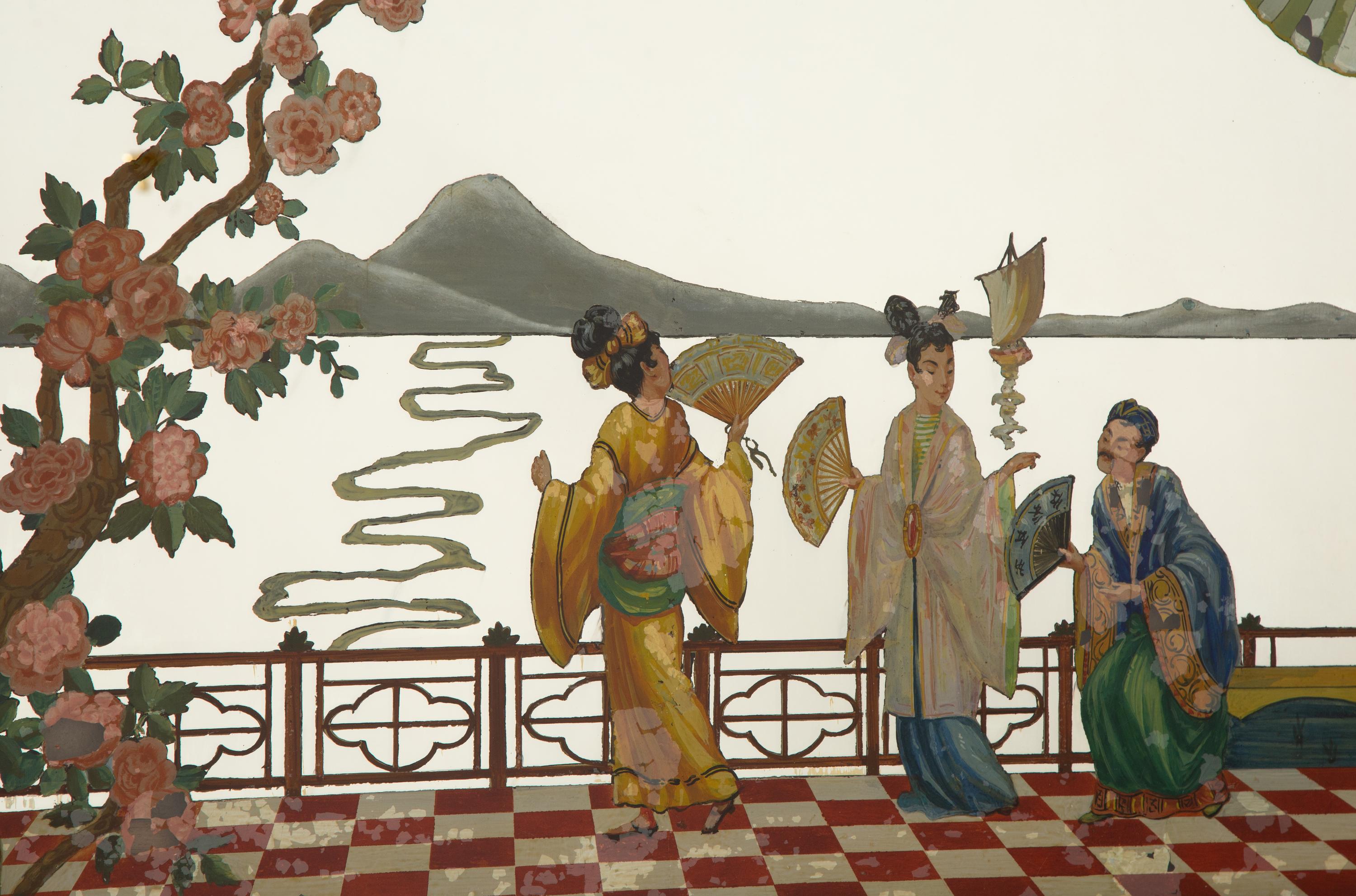 A "Chinese Chippendale" Style Ebonized and Parcel Gilt Reverse-Painted Glass Overmantel Mirror