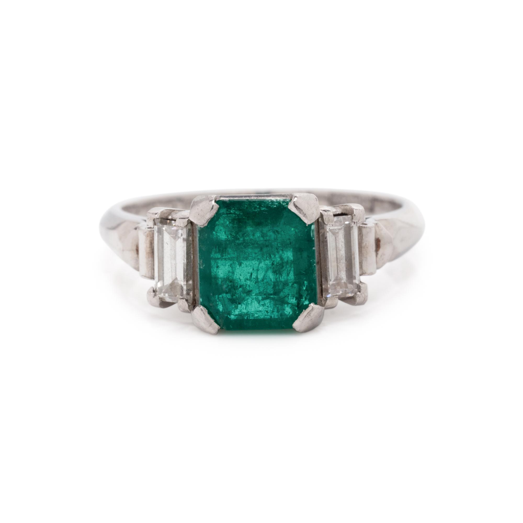PLATINUM, EMERALD, AND DIAMOND RING