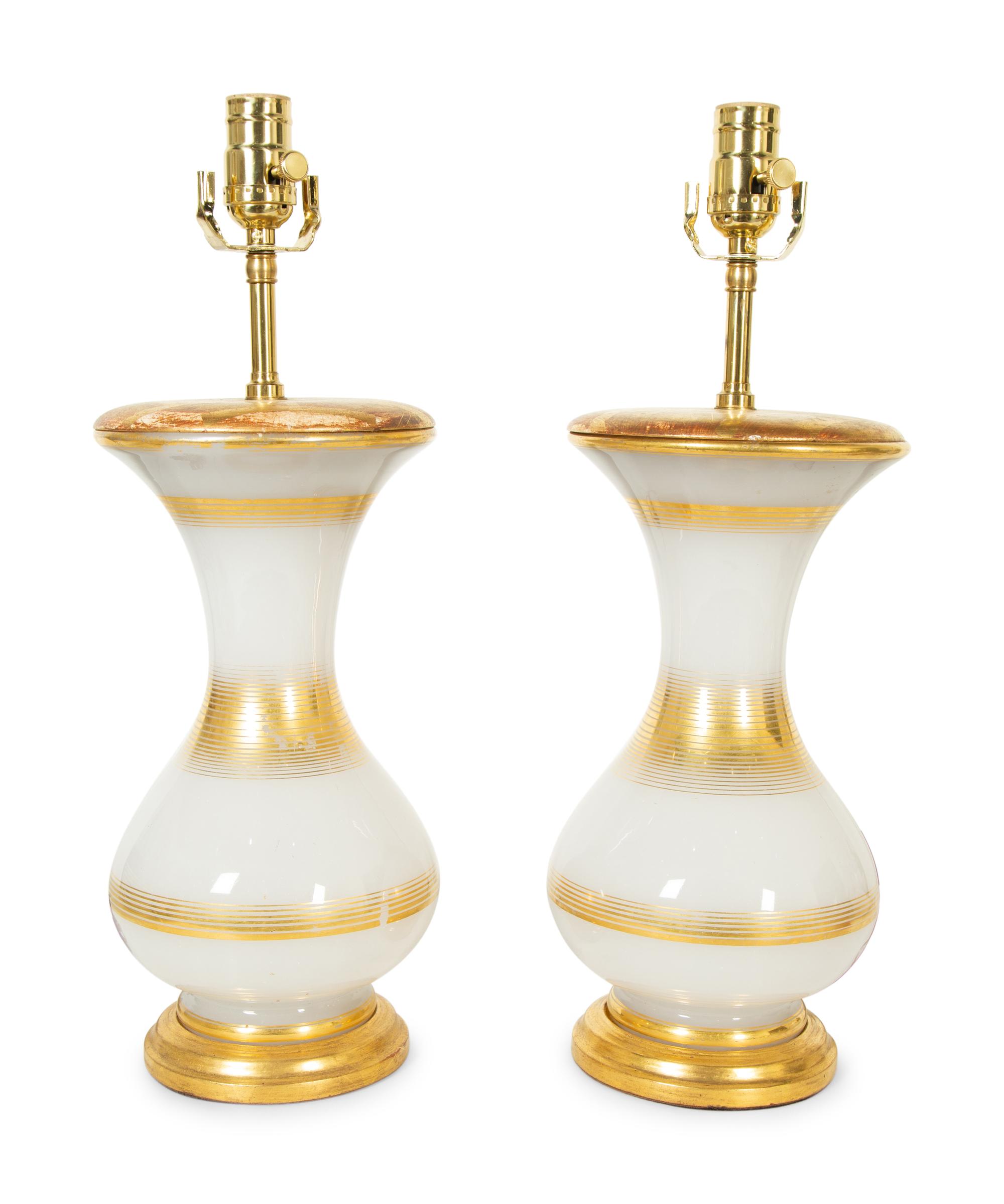 A Pair of Gilt Decorated Opaline Glass Lamps with Giltwood Mounts