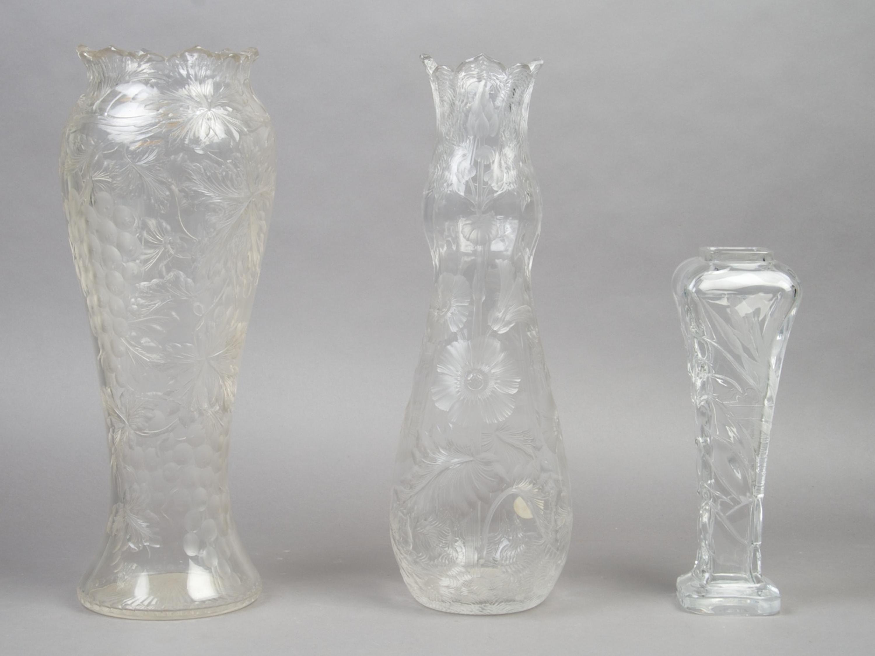 A Collection of Three Cut Glass Vases, Height of tallest 15 3/4 inches.