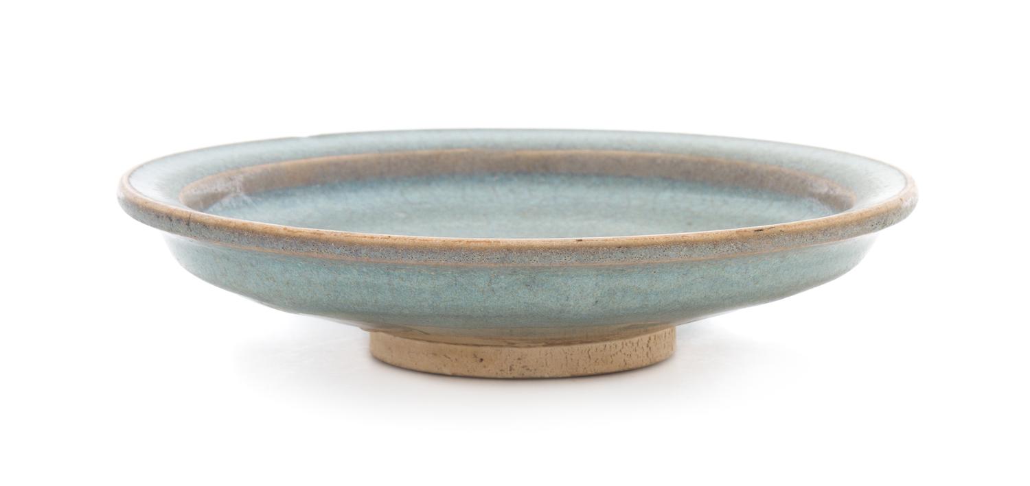 A Junyao Stoneware Dish Diameter 6 3/4 inches.