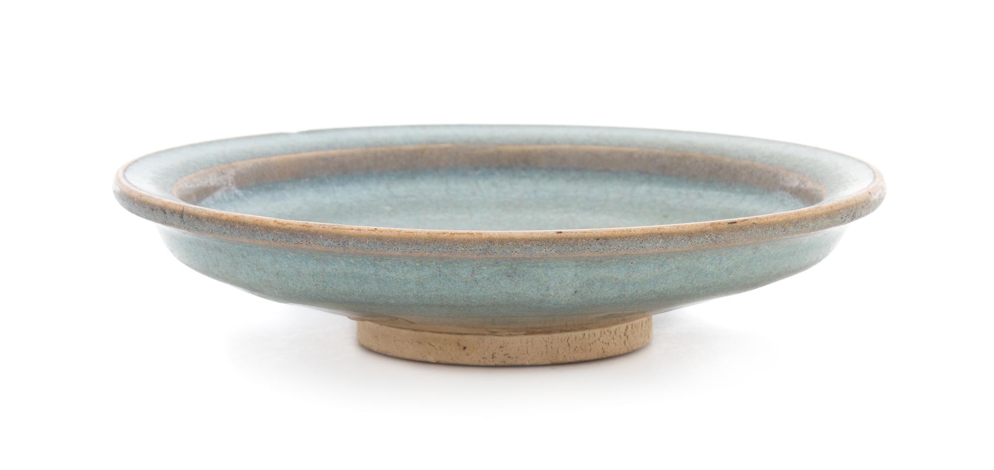 A Junyao Stoneware Dish Diameter 6 3/4 inches.