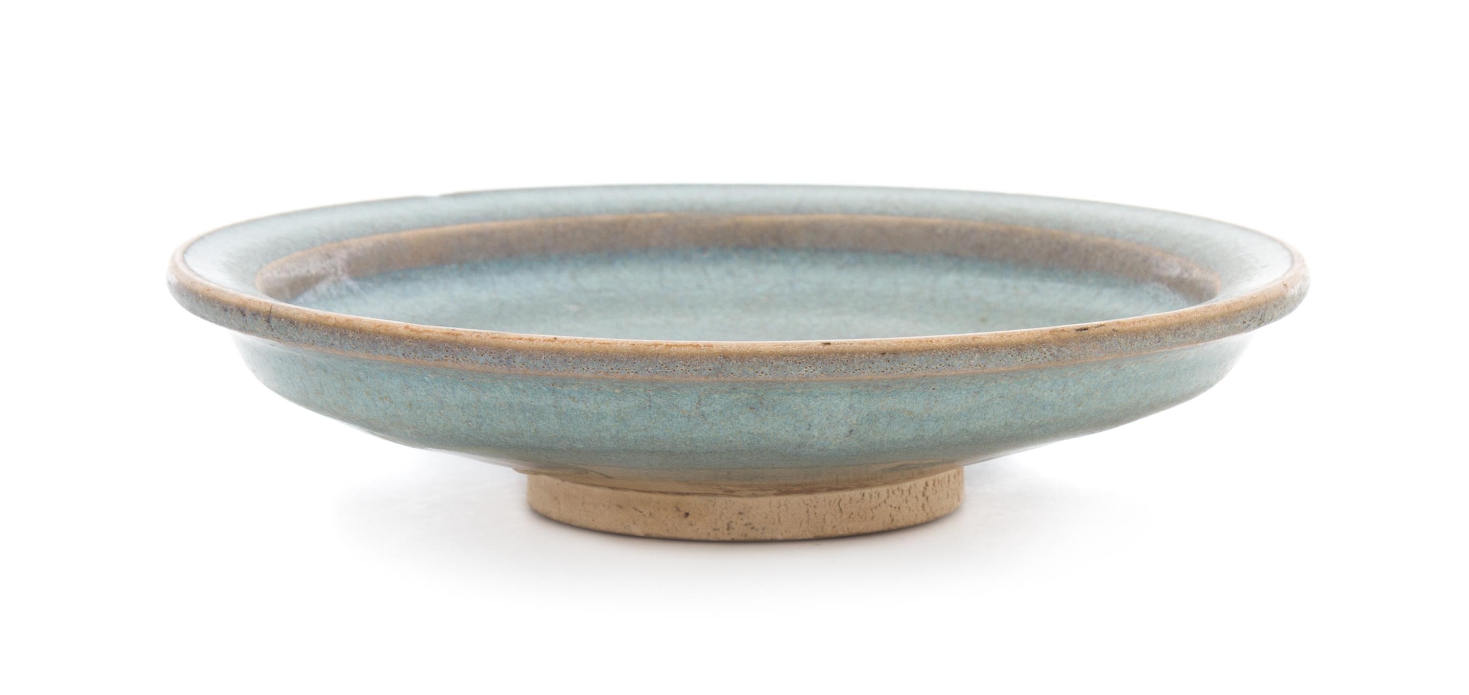 A Junyao Stoneware Dish Diameter 6 3/4 inches.