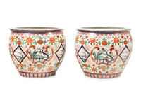 A Pair of Large Japanese Porcelain Fish Bowls