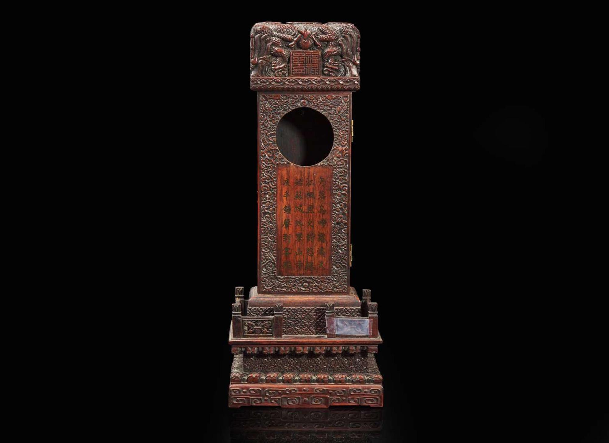 An unusual stele-form Chinese hardwood clock case 硬木鐘錶架子一件