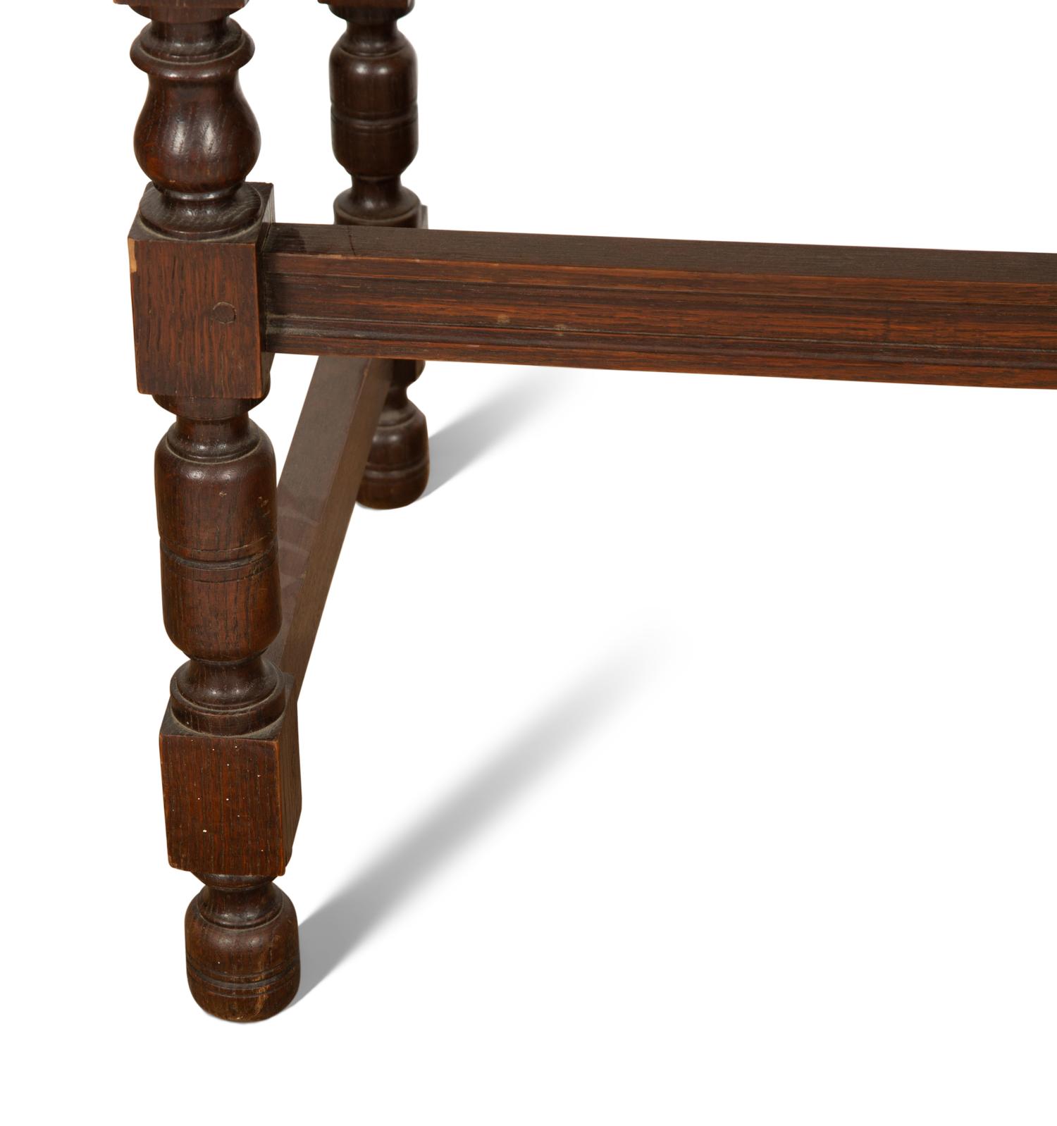 A Pair of Oak and Leather Side Chairs