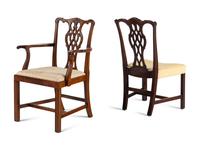 An Assembled Set of Ten George III Mahogany Style Dining Chairs