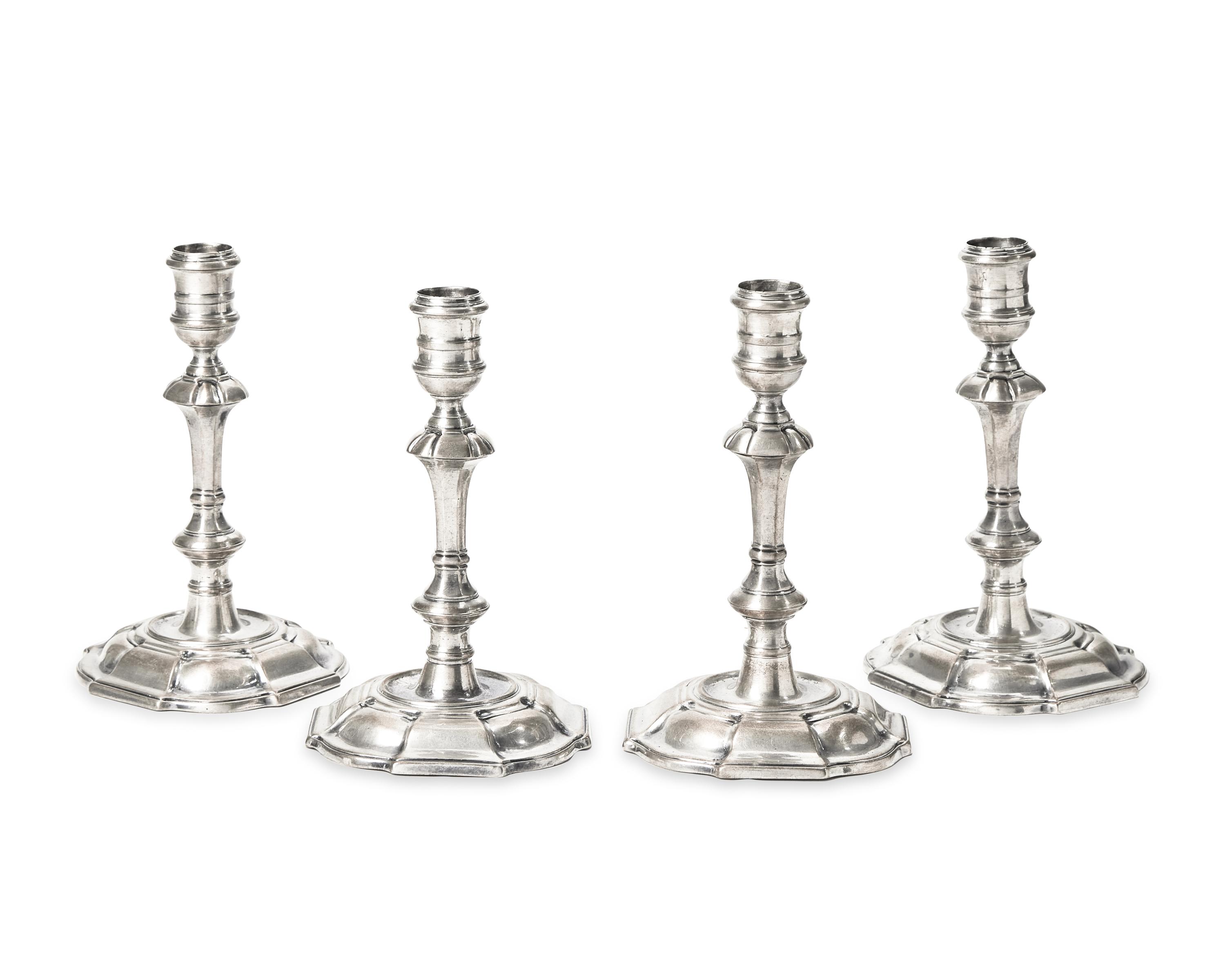 A Set of Four George II Sterling Silver Candlesticks