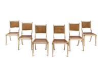A Set of Six Continental Painted and Parcel Gilt Klismos Dining Chairs