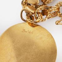 A 14K Yellow Gold Charm Bracelet