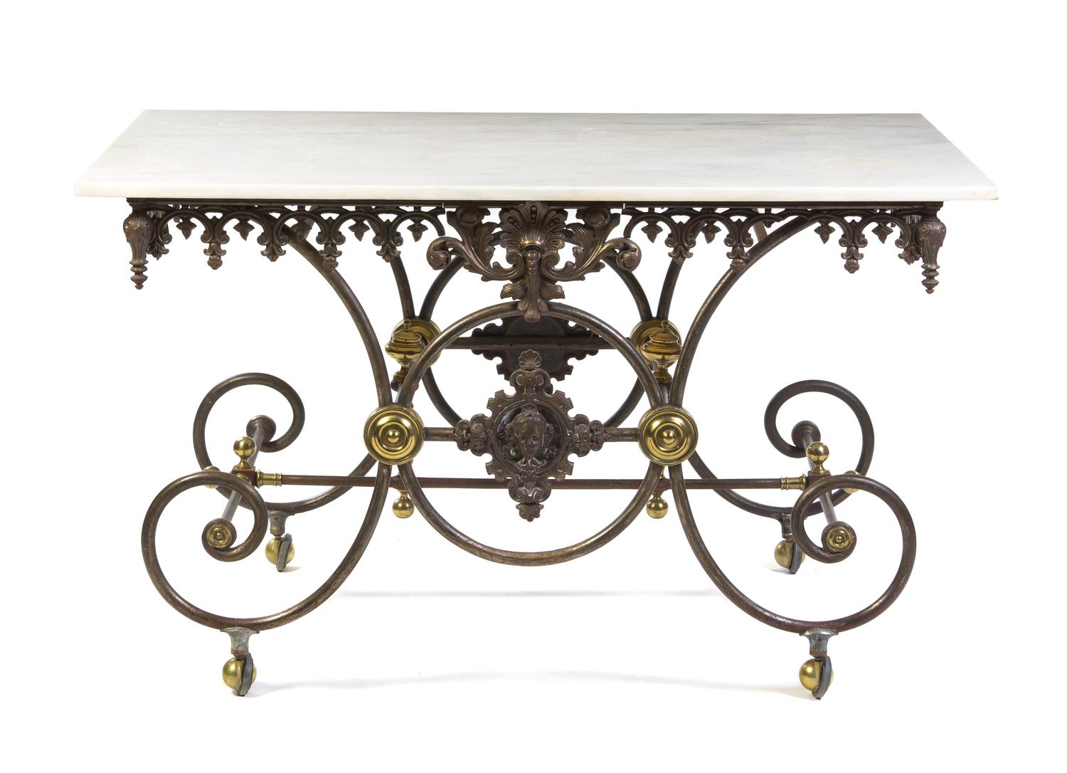 A French Steel and Brass Baker's Table, Height 33 1/4 x width 58 x depth 34 inches.