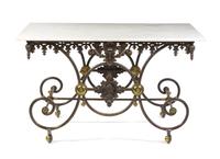 A French Steel and Brass Baker's Table, Height 33 1/4 x width 58 x depth 34 inches.