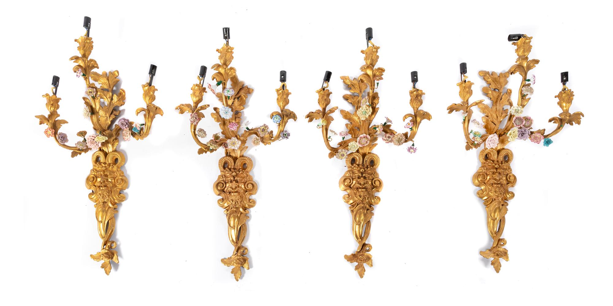 A Set of Four Neoclassical Porcelain Mounted Gilt Bronze Sconces