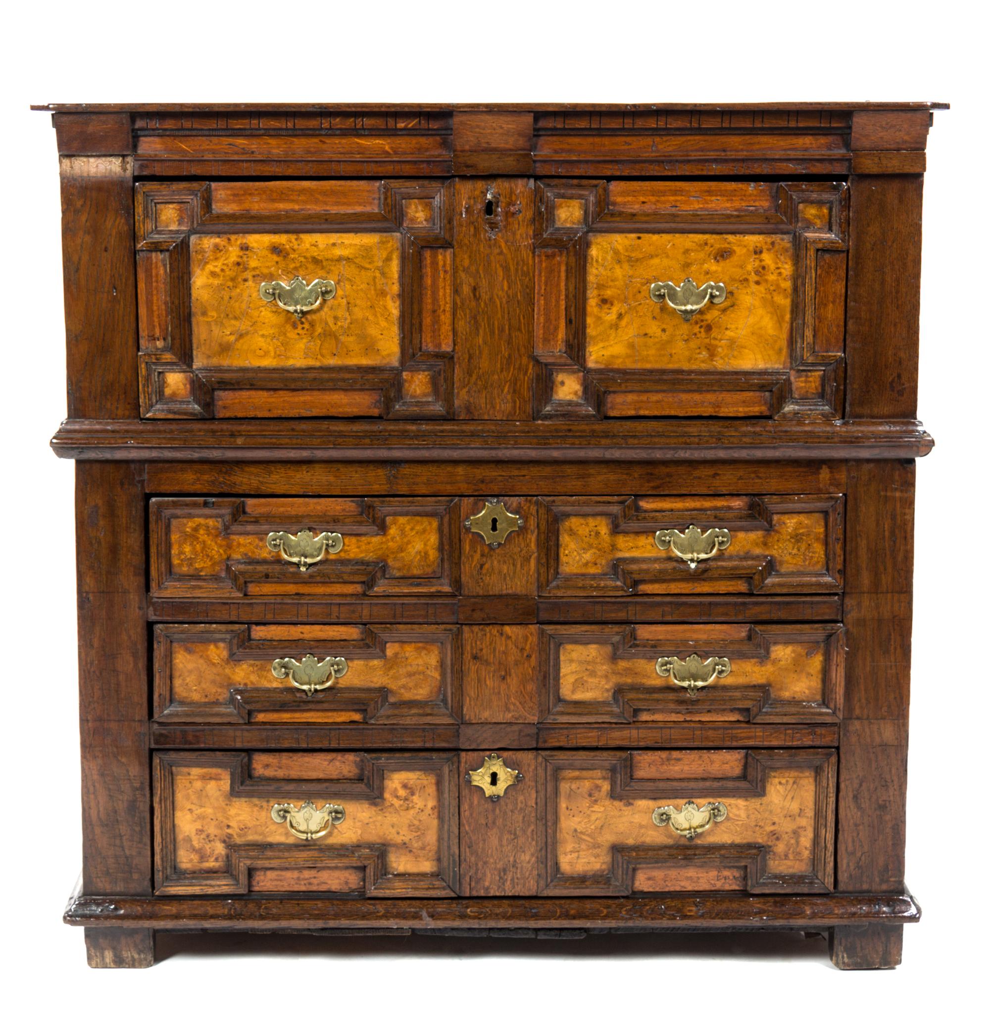 A Charles II Oak and Burlwood Chest of Drawers, Height 41 1/2 x width 41 1/2 x depth 20 1/2 inches.