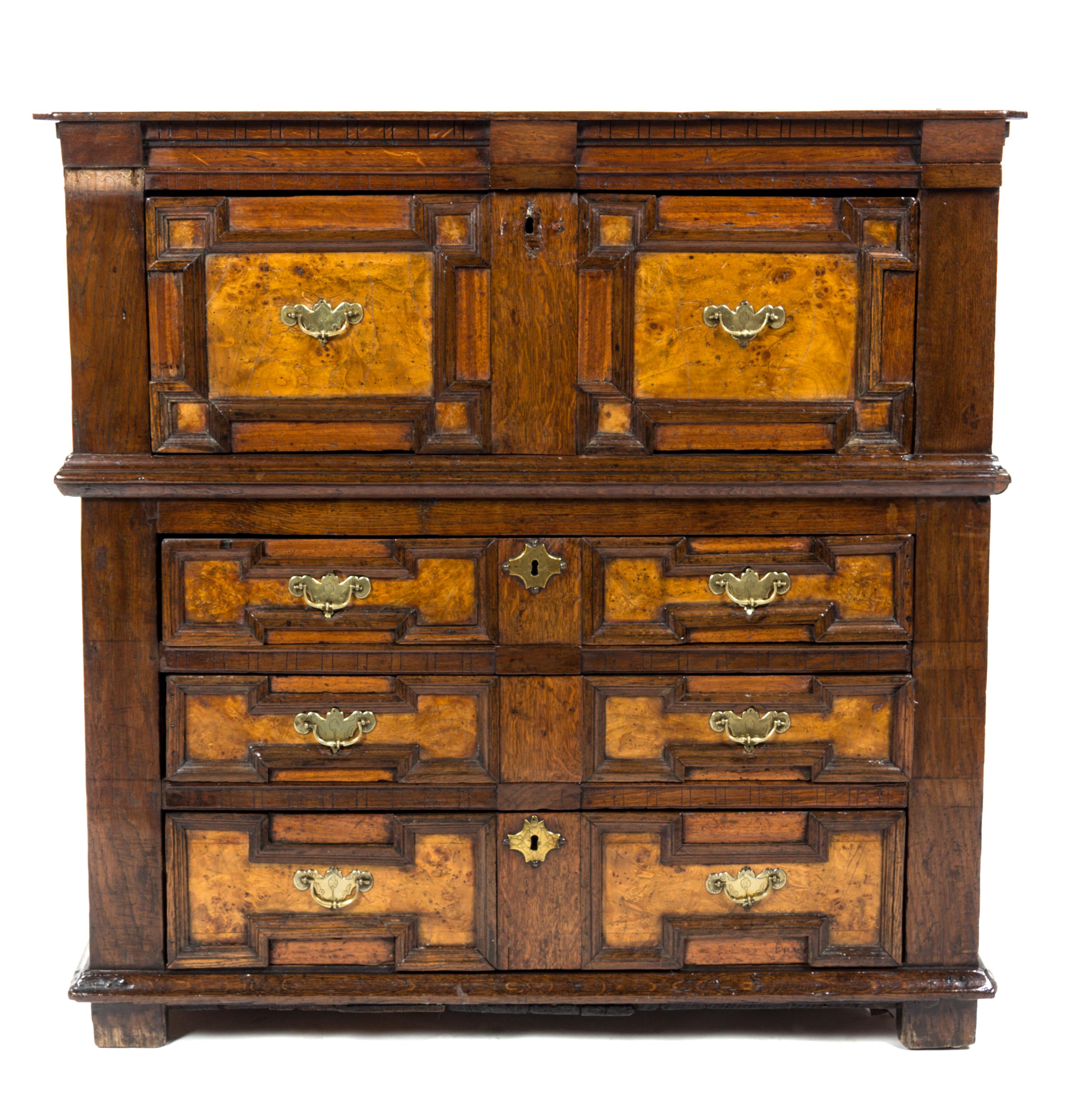 A Charles II Oak and Burlwood Chest of Drawers, Height 41 1/2 x width 41 1/2 x depth 20 1/2 inches.