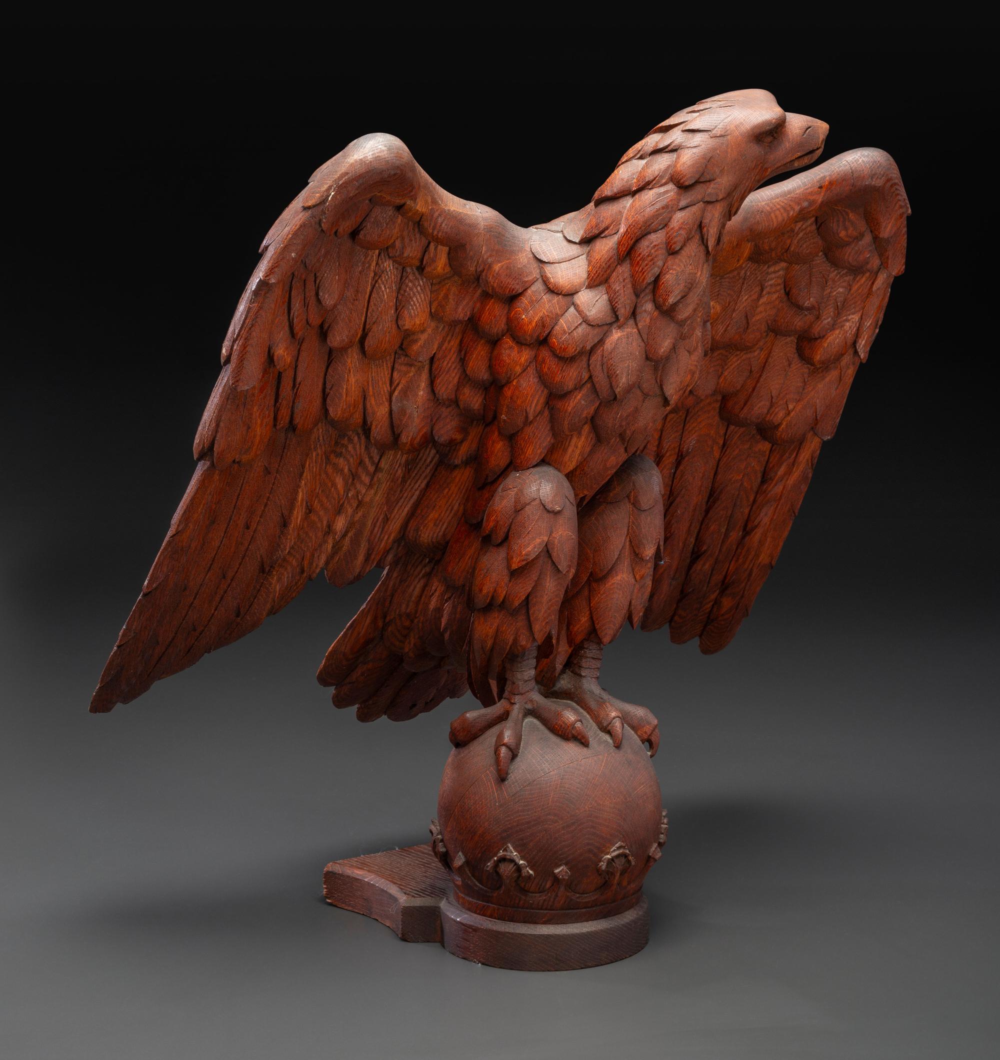 A Carved Wood Eagle Finial