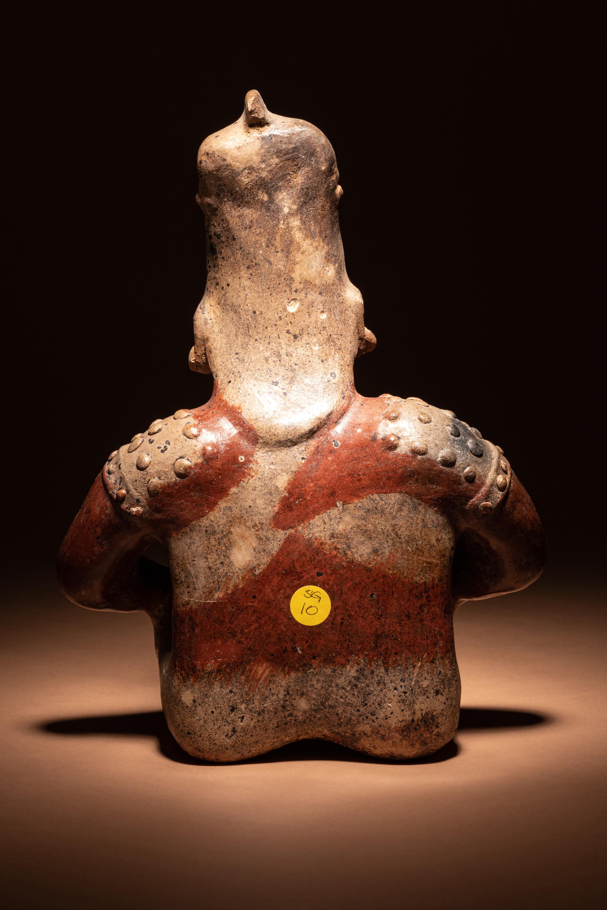 A Jalisco Terracotta Seated Figure