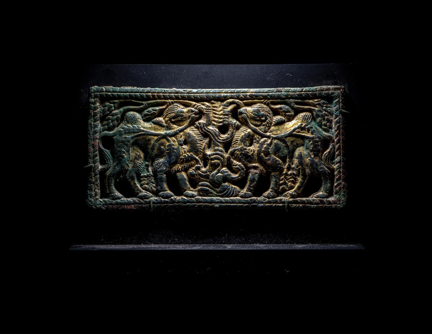 An Ordos Gilt-Bronze Plaque with Mythological Creatures