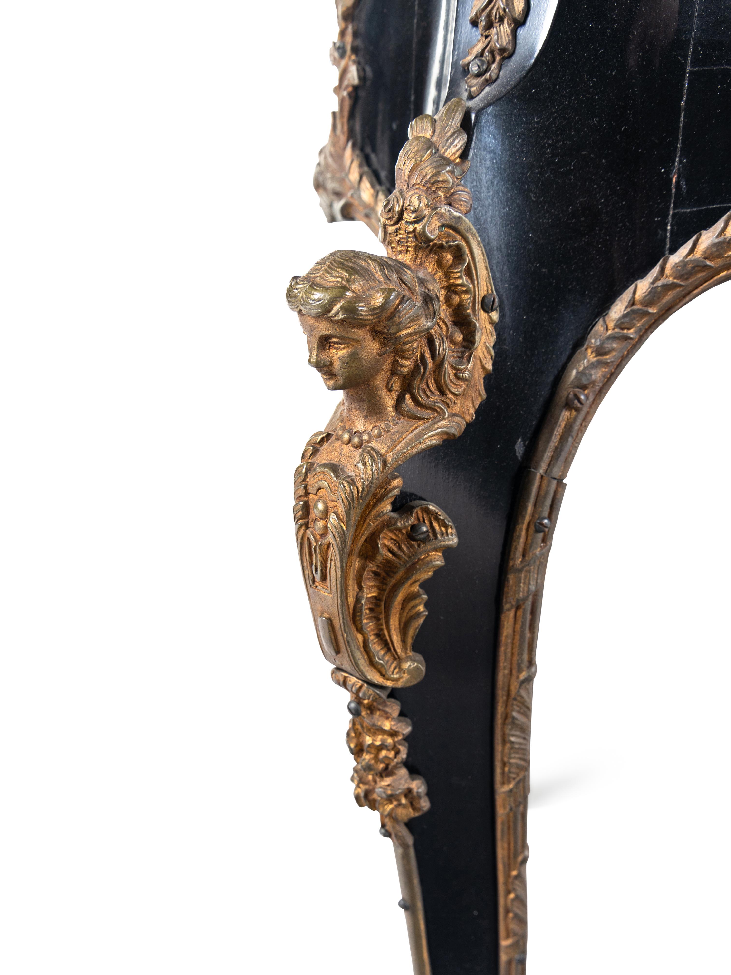 A Louis XV Style Gilt-Metal Mounted Ebonized Bureau Plat