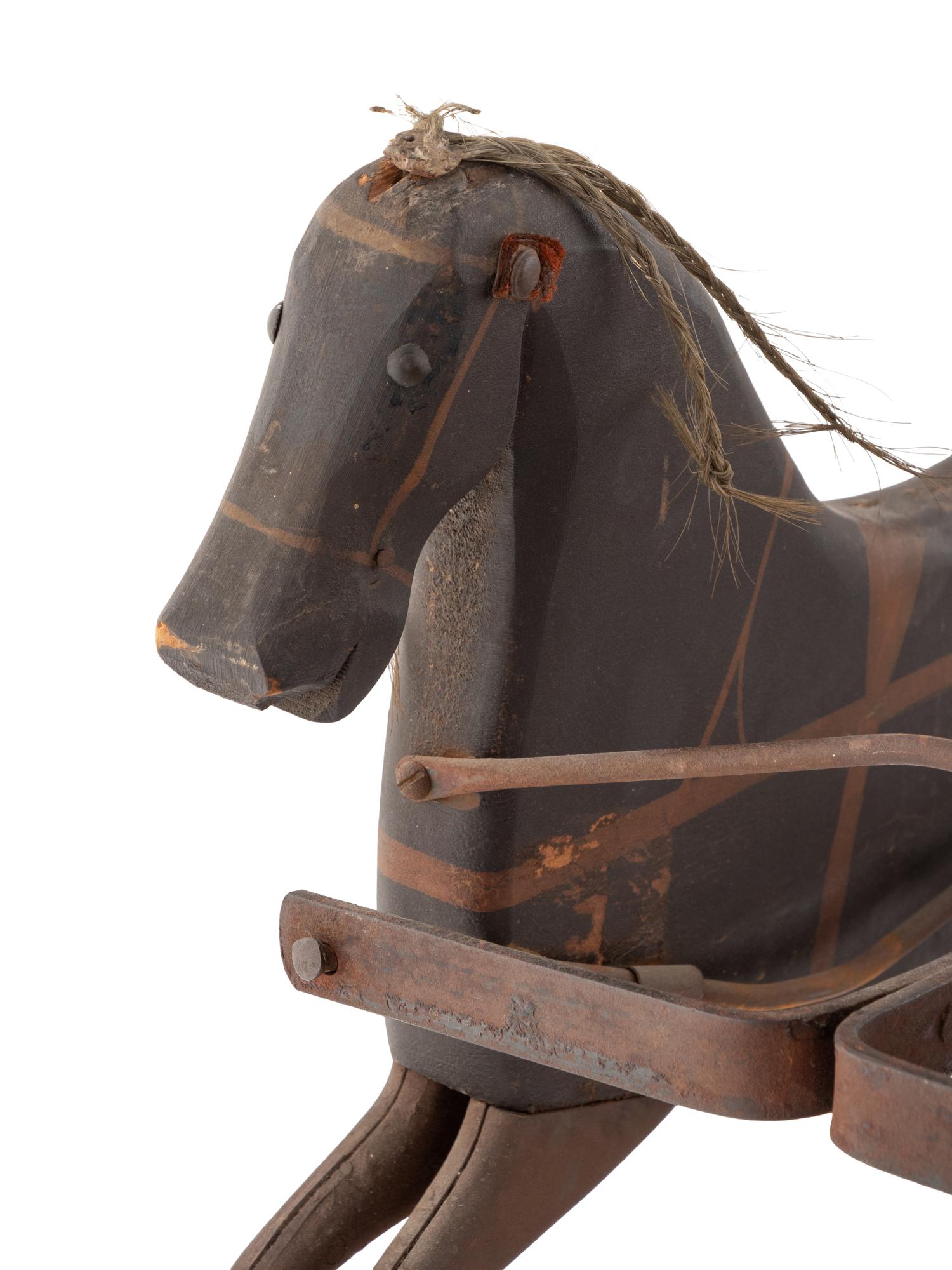 A Child's Carved Wood and Wrought Iron Two Horse Pedal Wagon