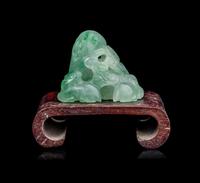 A Chinese Semi-Translucent Apple Green and Pale Celadon Jadeite 'Three Rams' Figural Group