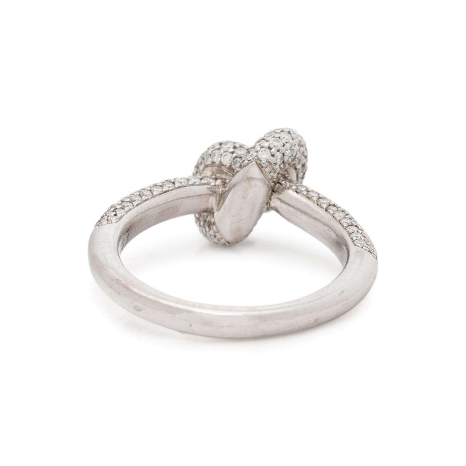 ENGELBERT, WHITE GOLD AND DIAMOND KNOT RING