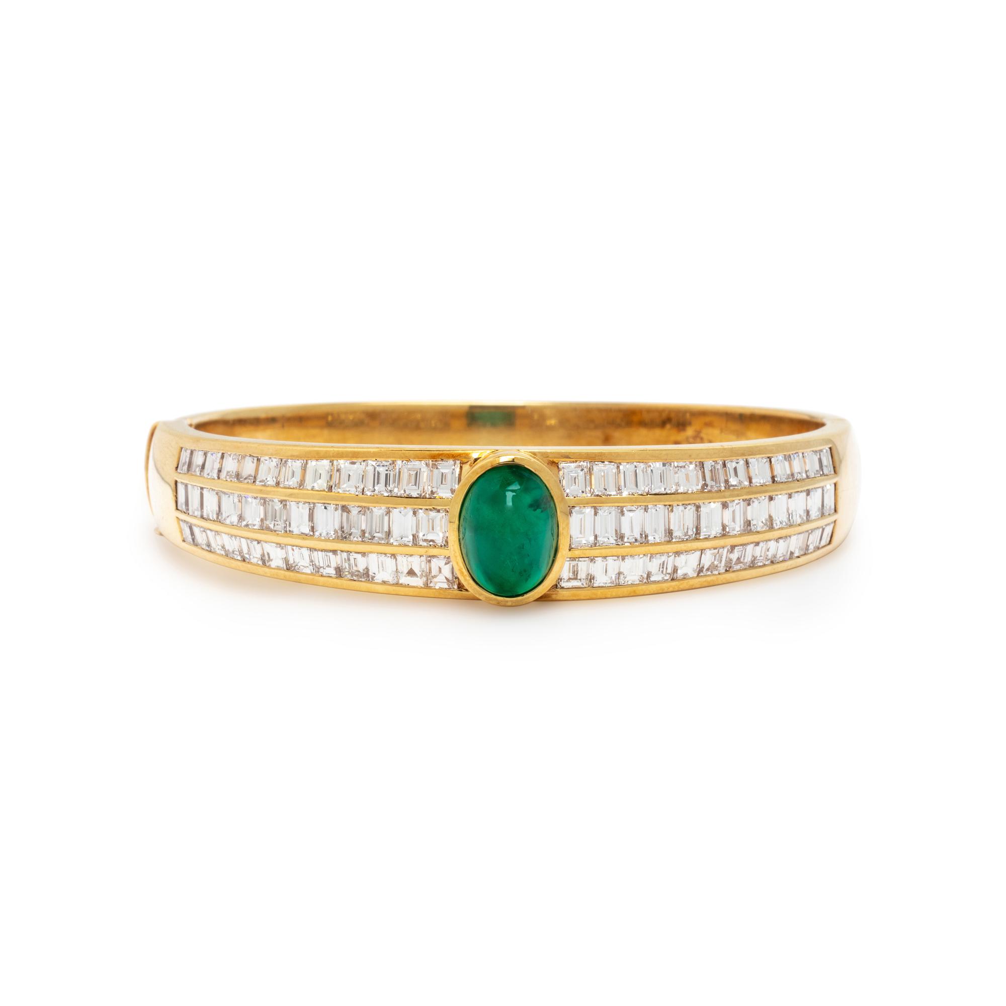 YELLOW GOLD, EMERALD, AND DIAMOND BANGLE BRACELET