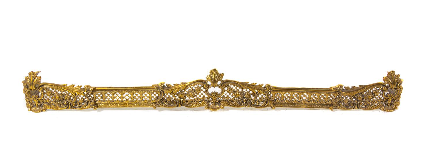A Neoclassical Gilt Metal Fireplace Suite