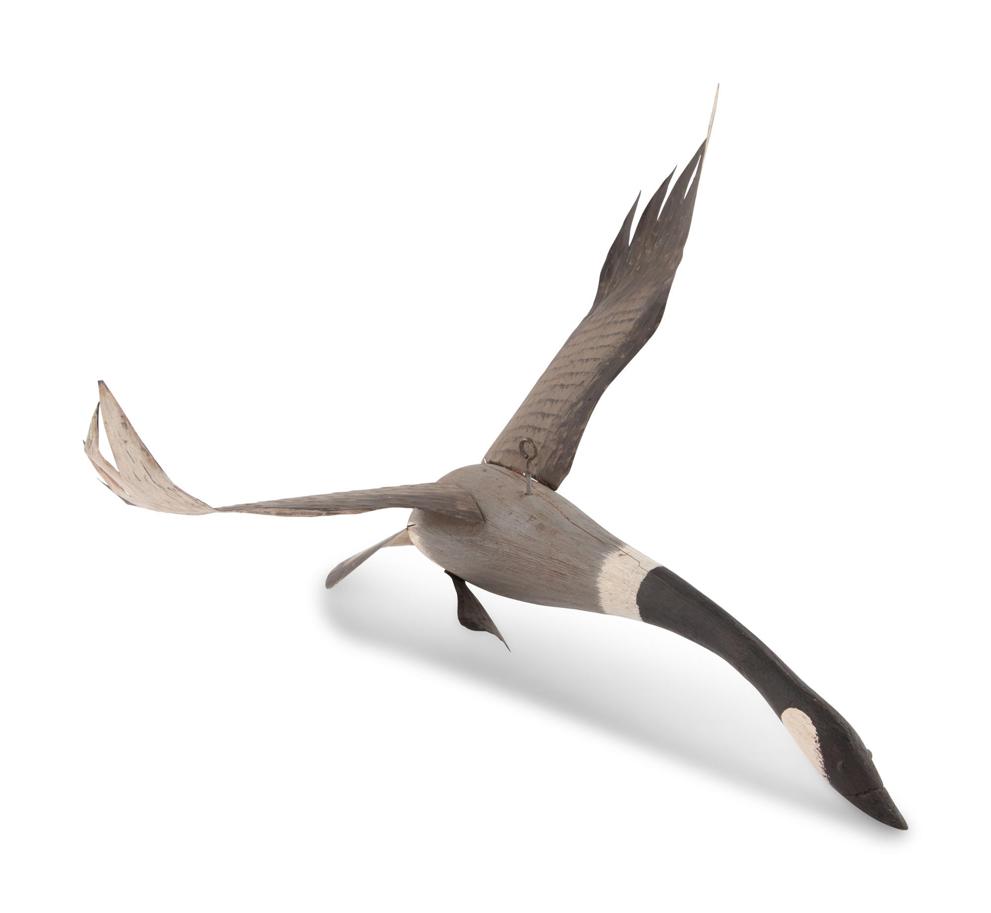 A Folk Art Carved and Polychrome Painted Canada Goose