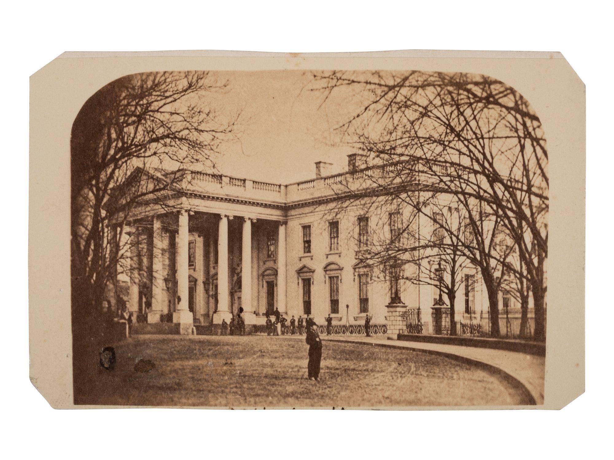 [LINCOLN WHITE HOUSE]. [WARREN, Henry F., photog., attrib.]. CDV of the White House possibly showing Tad Lincoln in the foreground. [Washington, DC, 6 March 1865].