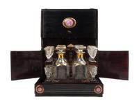 A Continental Brass Inlaid and Porcelain Mounted Cave a Liqueur, Height of case 10 1/2 x width 12 7/8 x depth 9 1/2 inches