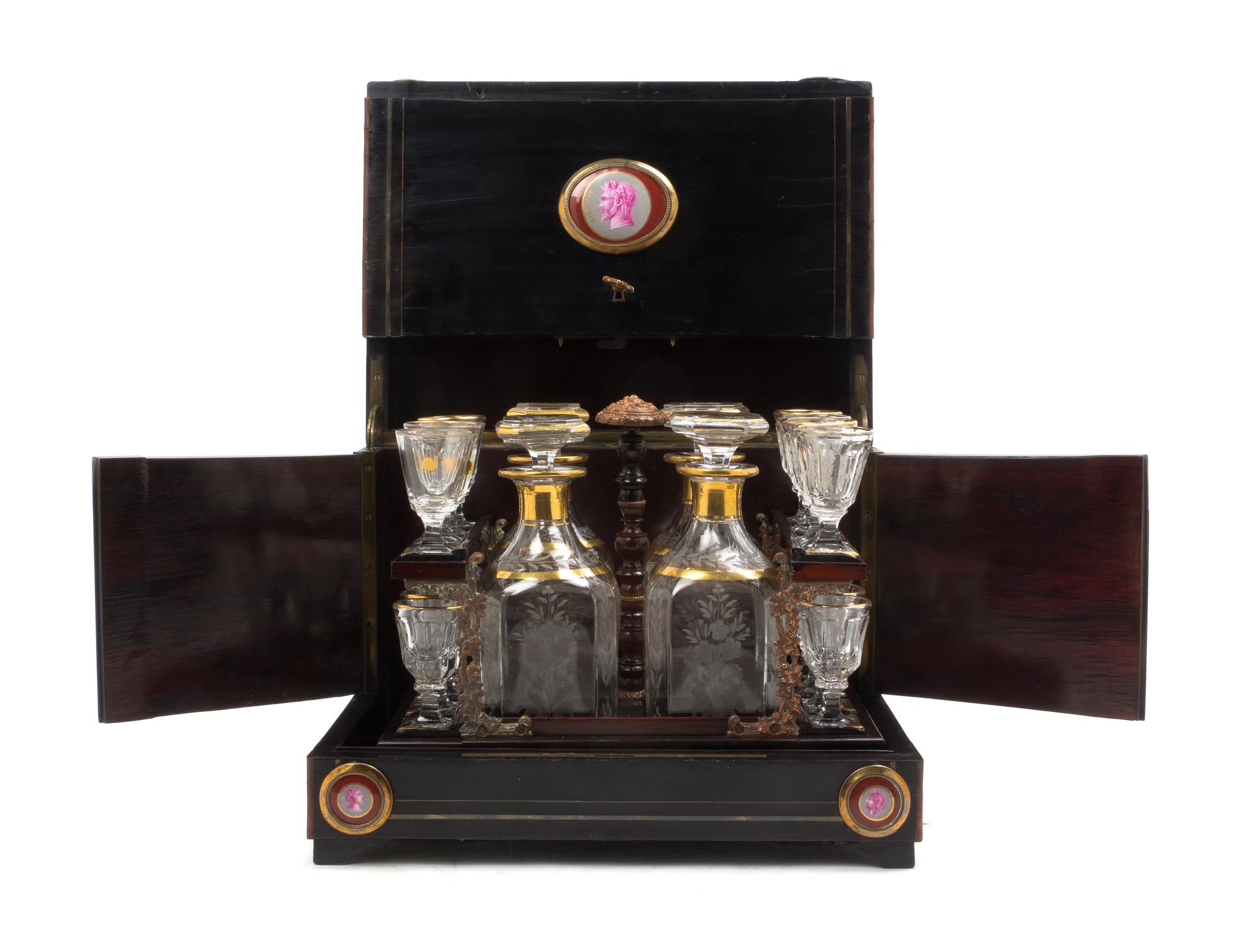 A Continental Brass Inlaid and Porcelain Mounted Cave a Liqueur, Height of case 10 1/2 x width 12 7/8 x depth 9 1/2 inches