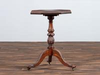 A Late Federal Carved and Figured Mahogany Octagonal Tilt-Top Candlestand