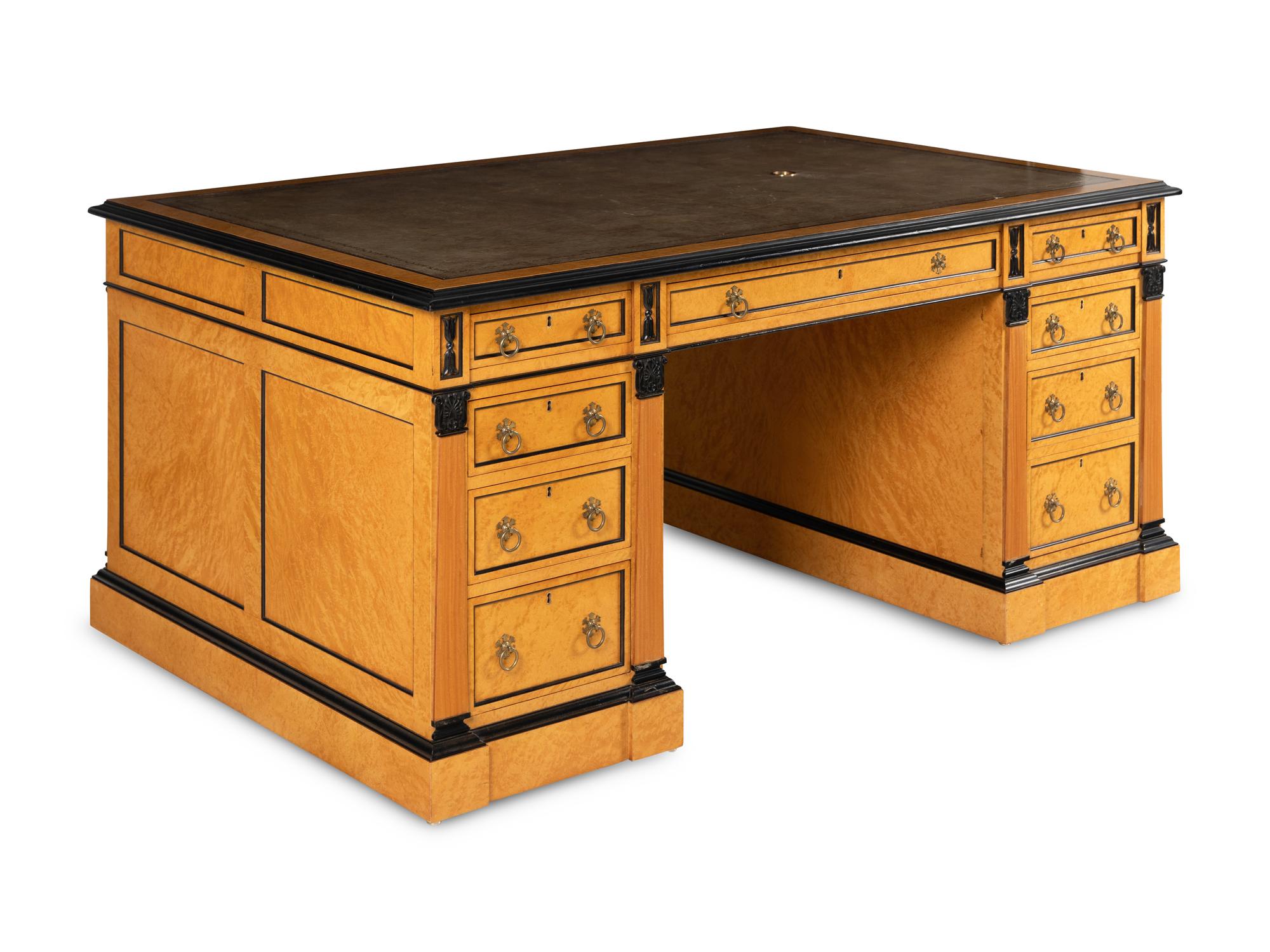 A Russian Neoclassical Style Birch and Parcel Ebonized Partner's Desk