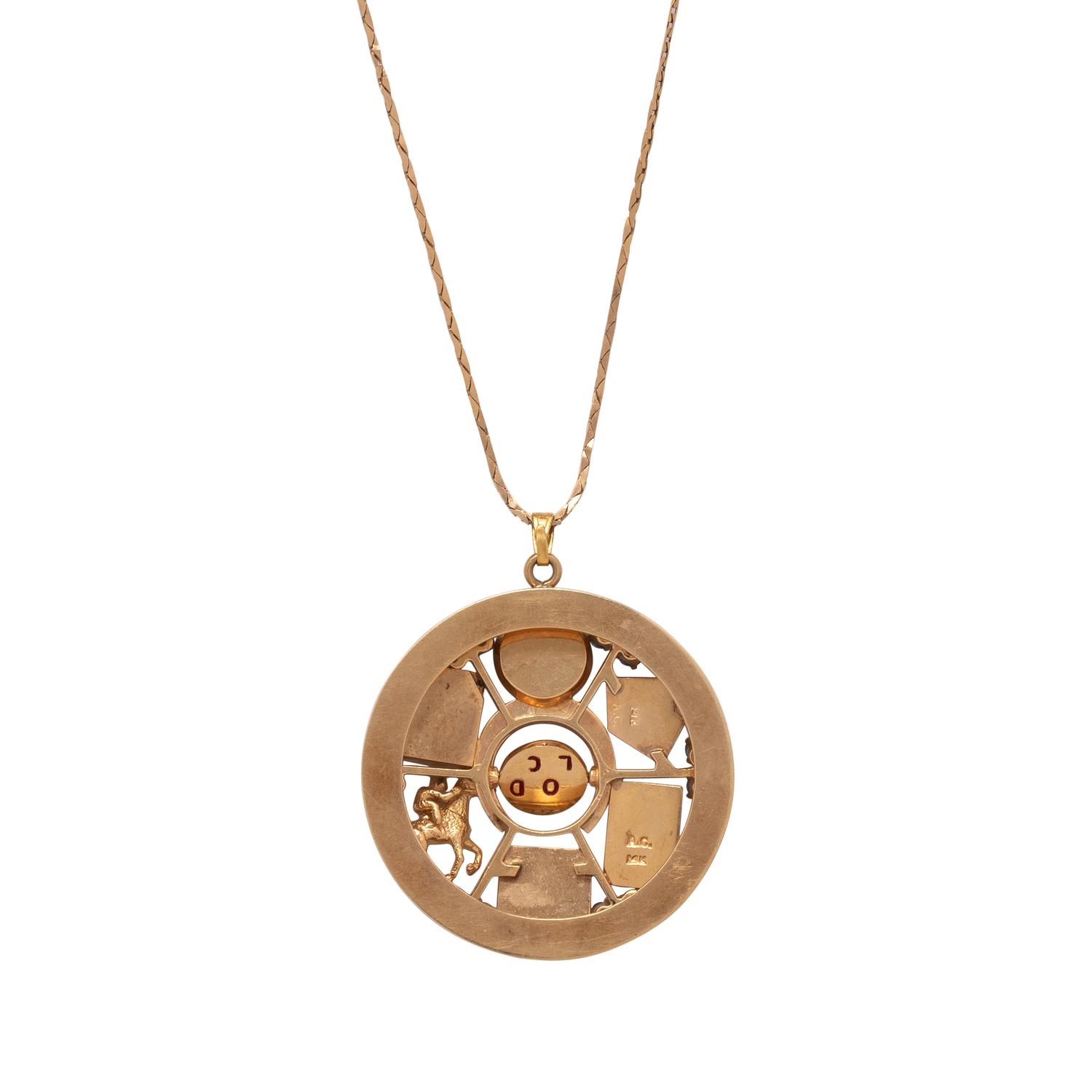RETRO, YELLOW GOLD, SAPPHIRE AND ENAMEL 'GOOD LUCK' PENDANT/NECKLACE