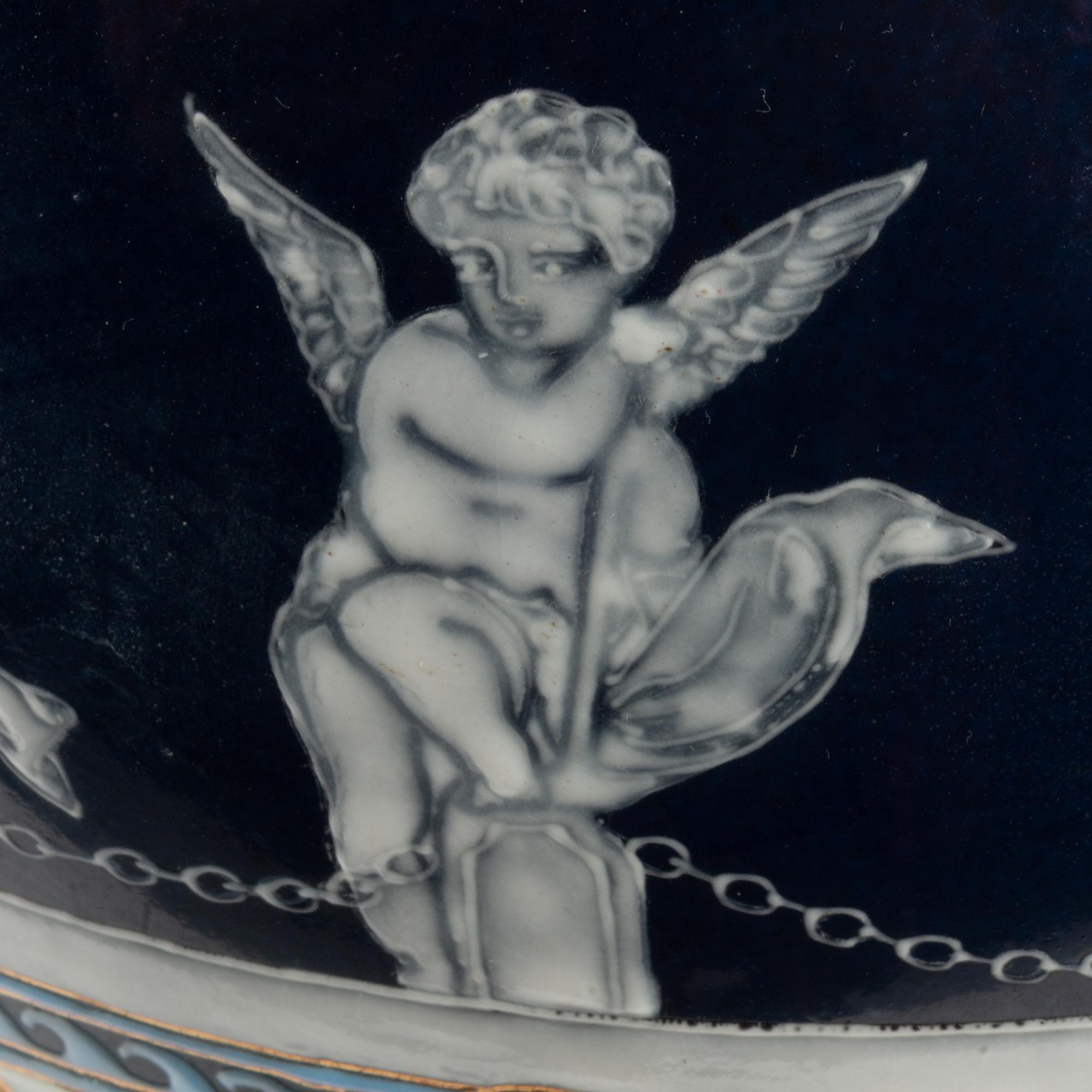A Pair of Pâte-sur-Pâte Urns