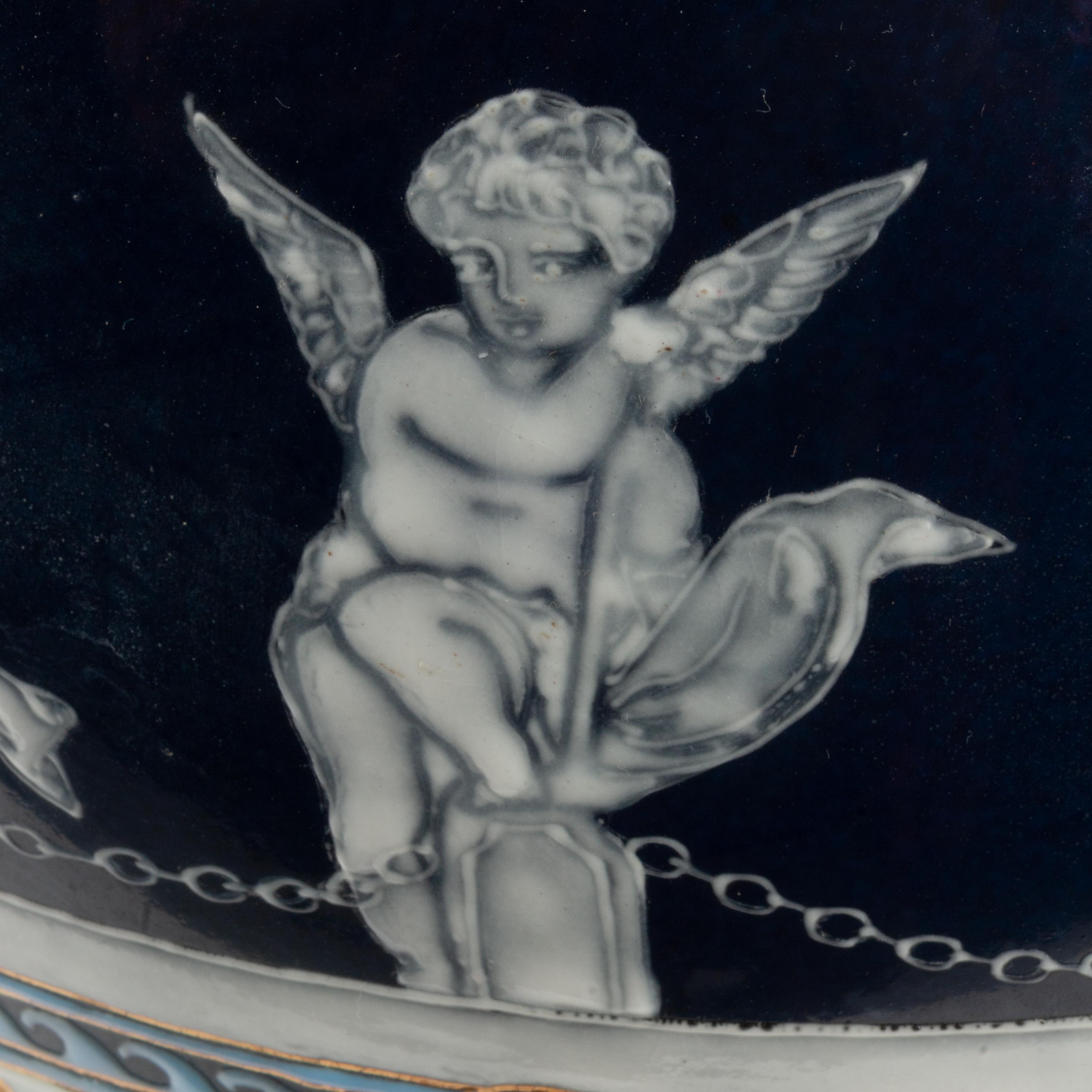 A Pair of Pâte-sur-Pâte Urns